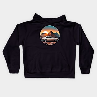 Vintage 70s retro classic car in mountain roads during sunset Kids Hoodie